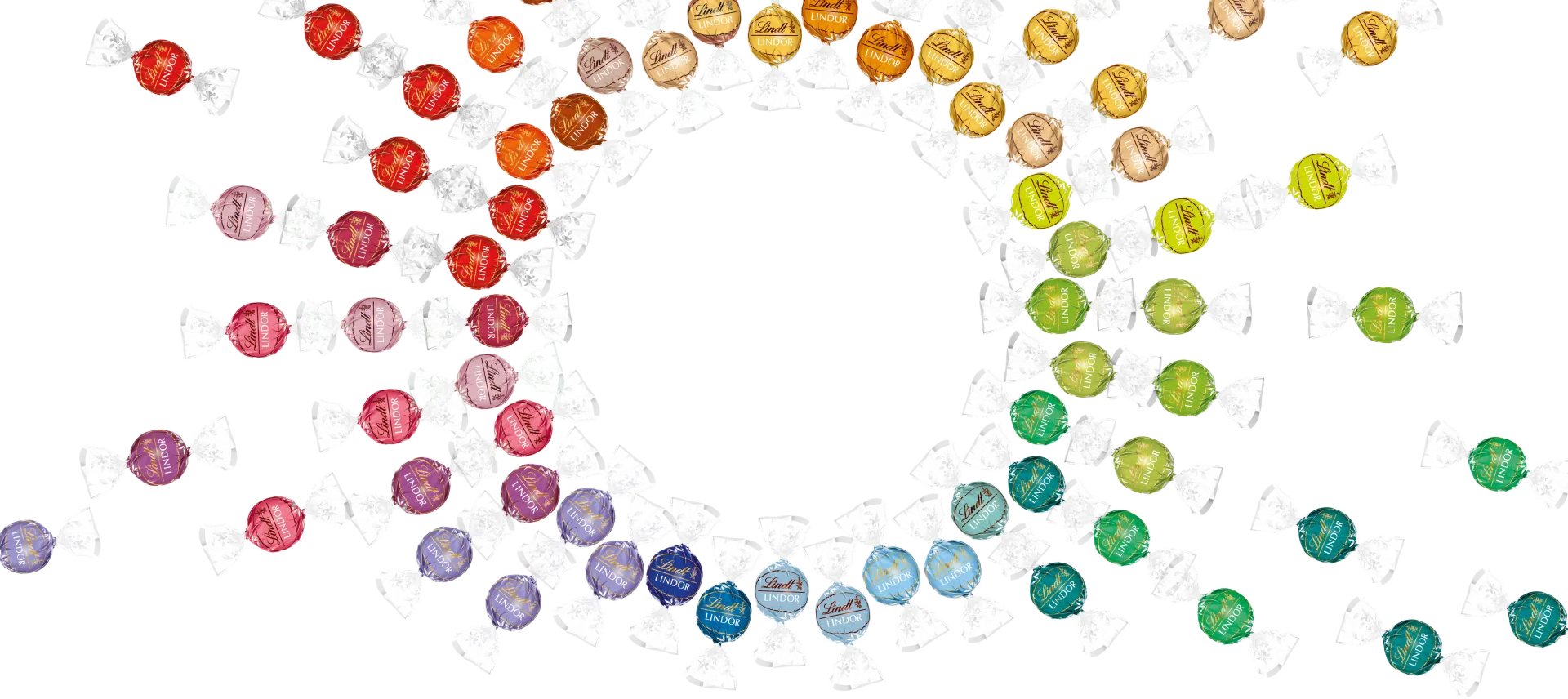 Many LINDOR truffles in different flavors in arranged in circles (Photo)